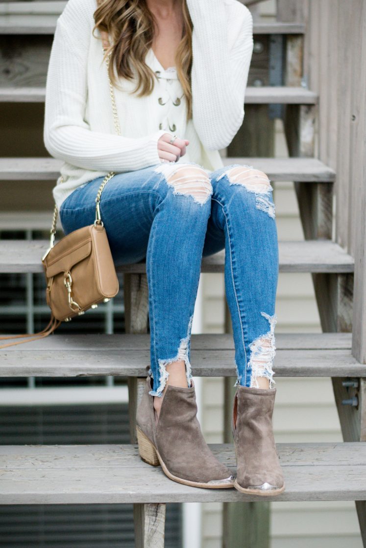shop the mint love this lace up sweater, ivory laceup sweater, jeffrey campbell cromwell cut out booties outfit, american eagle shredded raw hem skinny jeans